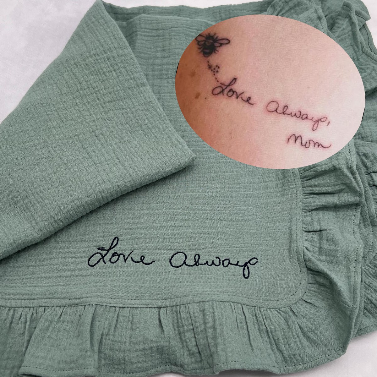A handwritten message embroidered onto an organic muslin baby blanket